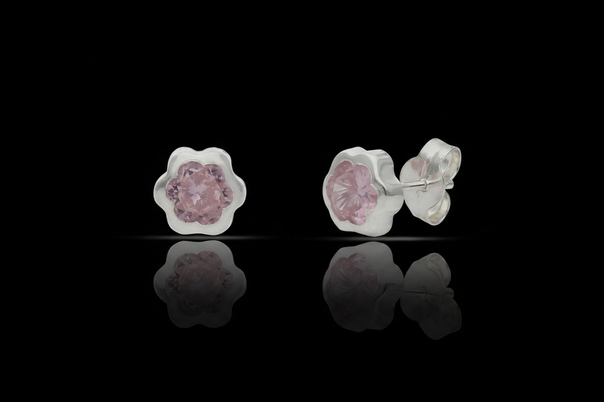 Pendientes Fleur rosa sobre fondo negro